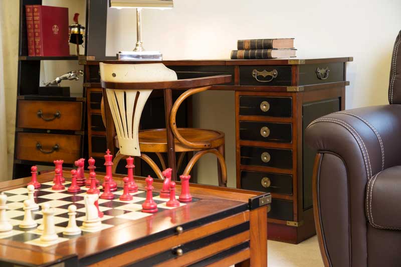 Solid cherry wood campaign desk, black painted drawers, brass fittings