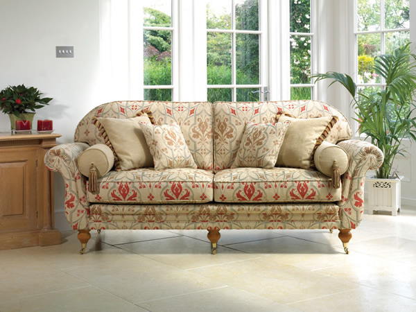 Traditional sofa, bolster cushions, curved arms,