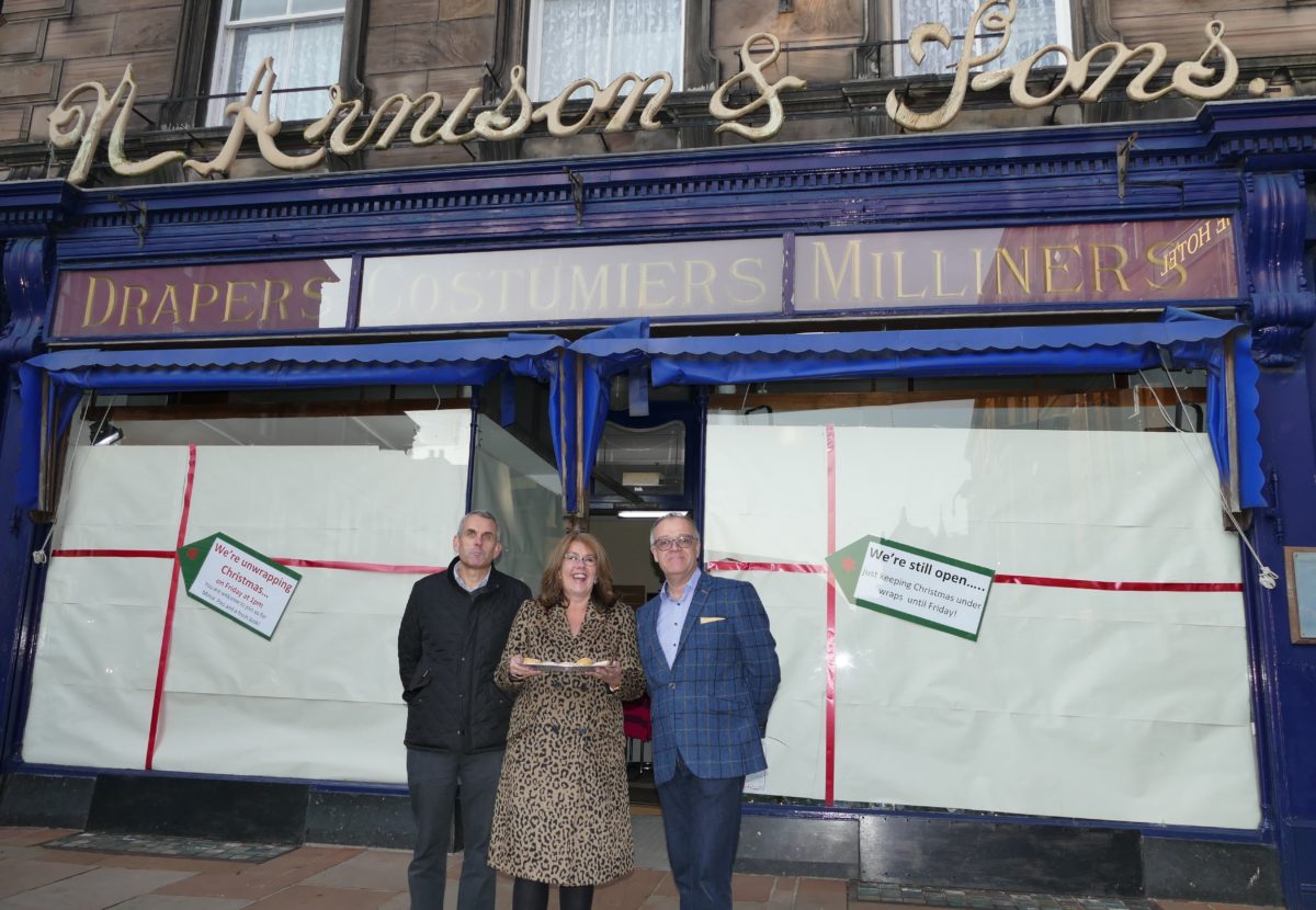 John Youngs uncveils the Arnisons Christmas window